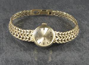 Goldene Damenarmbanduhr