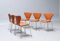 Arne Jacobsen 1902 - 1971. Sæt på seks 7er stole, model 3107, nybetrukket med cognacfarvet læder 6