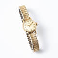 Omega damarmbandsur i 18 k guld 