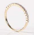 Alliancering af 14 kt guld , 0.27 ct. 