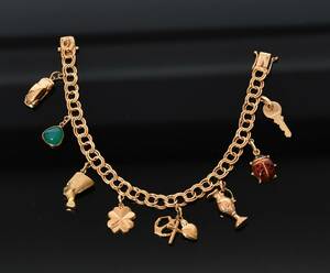 Berlockarmband, 18-k guld