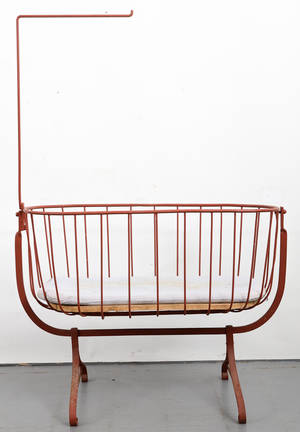 Vagga av bemålat järn