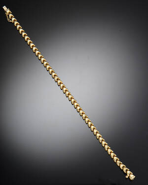 Armbånd af 14 kt. guld og hvidguld