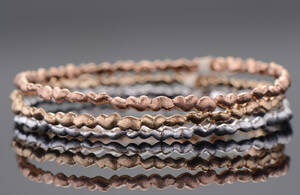 Aagaard, tre armringe af guld, rødguld og hvidguld 3