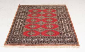 Håndknyttet orientalsk tæppe