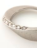 Bræmer Jensen. Ring af 14 kt. hvidguld prydet med brillanter, i alt 0.06 ct.