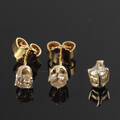 Brillant sæt, vedhæng og ørestikkere i 8 kt. guld 0.75 ct.