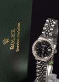 Rolex Oyster Perpetual Date damearmbåndsur af stål m safirlynette.