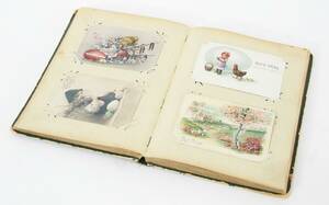 Album innehållande ca.100st gratulationskort, 1900-talets första hälft