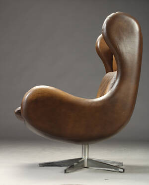 Dansk møbelproducent. Lænestol, brunt skind
