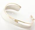 Heiring. Armring af 14 kt. guld og sterling sølv prydet med brillanter