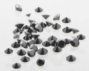 Talrige små sorte uindfattede diamanter, ialt ca. 7.17 ct. Denne auktion er annulleret - se nu vare 1932103