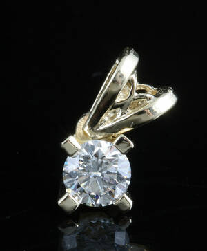 14k diamond pendant set with brilliant cut diamond 0.28ct