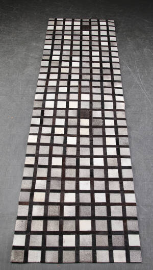 Patchwork tæppe af koskind. 295 x 80 