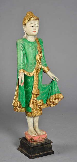 En stående buddha af træ. Thailand, 1900-tallets slutning