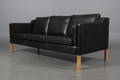 Stouby. Tre-pers. sofa, model Eva, sort læder.
