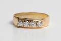 Ring af 14 kt. guld med fire Cubic Zirkonia