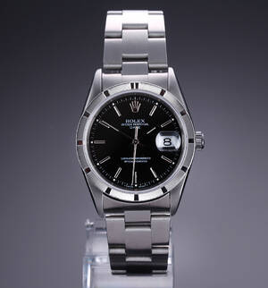 Rolex Date. Vintage herreur i stål med sort skive, ca. 1997   Denne vare er sat til omsalg under nyt varenummer 4278216