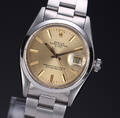 Rolex Date. Vintage herreur i stål med gylden skive, ca. 1978