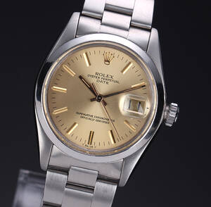 Rolex Date. Vintage herreur i stål med gylden skive, ca. 1978