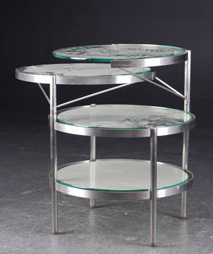 Cirkulært bord af glas og stål