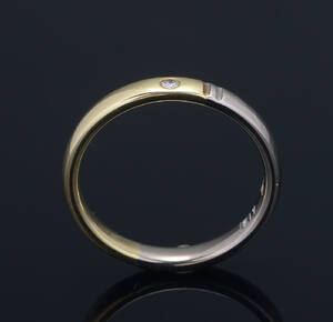 Ring af guld og hvidguld med brillant, ca 0.02 ct