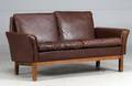 Dansk møbelproducent. 2-pers. sofa, brunt læder