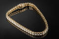 Brillantarmbånd af guld 18 kt., i alt ca. 4.16 ct.